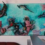 A 15 foot long by 5 foot high mural aquarium with papier mache fish and other assorted marine life.
©1998 Kristen Muench
photo by Debra Whalen