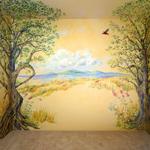 Two lovely character trees with birds and small creatures form an Arbor Mural over this girl's headboard and surrounding wall areas. Private Home, 
©2006 Kristen Muench
photo by KM