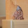 A little gnome warrior painted into the faux crevice.